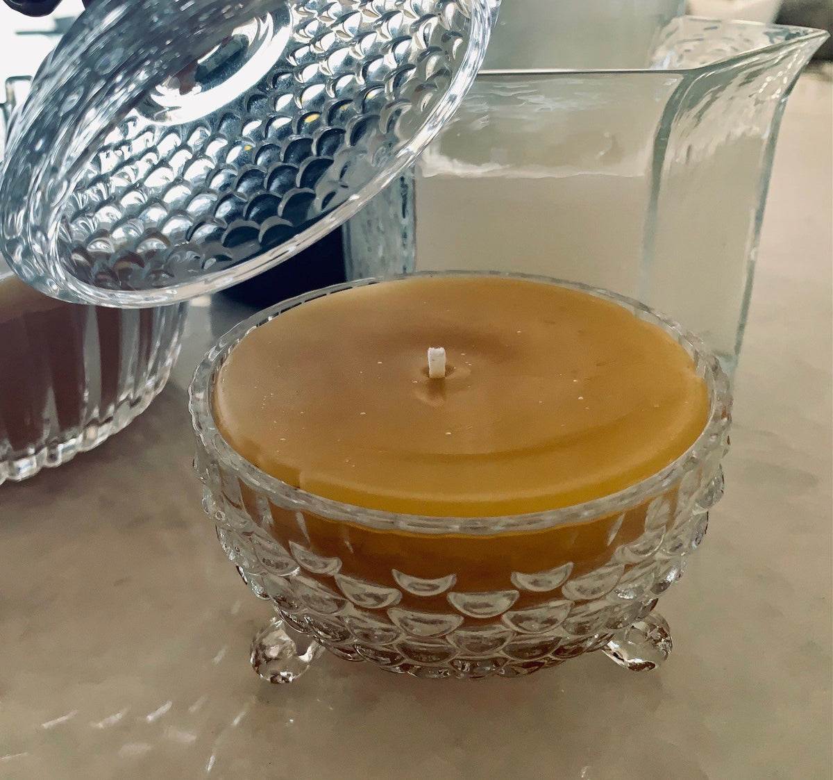 Candle in a lidded crystal bowl