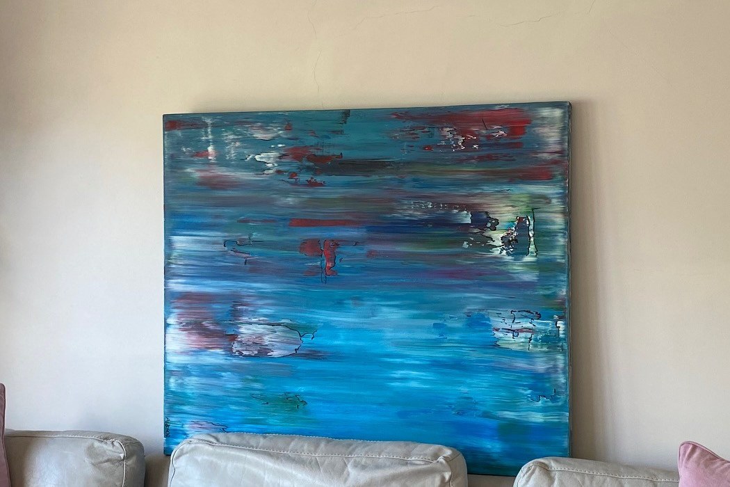 Tidal hanging above a sofa