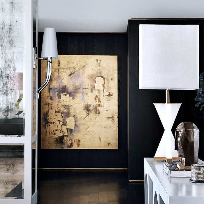 Gold Leaf on a dark timber wall in a Cape Town apartment